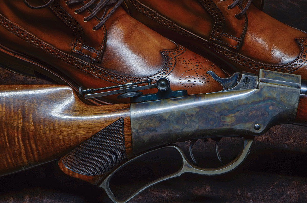 New leather, old rifles and fine walnut: The rifle is a Ballard Union Hill No. 8, chambered in 32-20, fitted with a Marlin improved vernier mid-range tang sight. The boots are by Allen Edmonds.